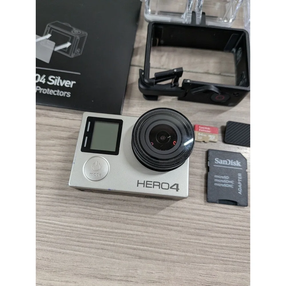 GoPro Hero 4 Silver Edition- with Accessories and Case Included